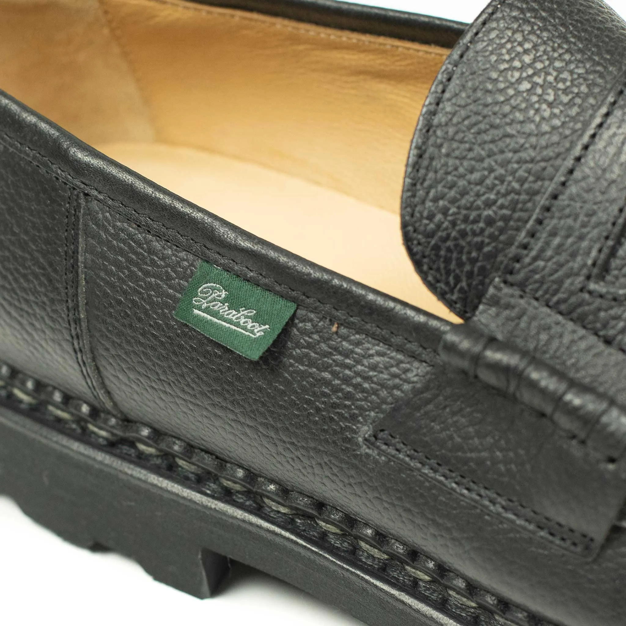 Reims piped seam loafers in black scotch grain leather
